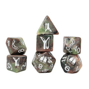 Sirius Dice Stranger Things Adventure Dice - Lucas (PREORDER) - Set of seven marbled green and brown polyhedral dice with white engraved fantasy symbols and numbers.