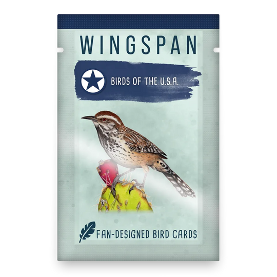 Wingspan: Birds of The U.S.A - Wingspan expansion pack with a brown and white bird on yellow flowers, blue and white title banner, card game packaging.