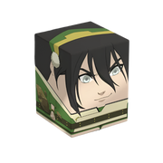 Squaroes 100+ Boulder: Avatar The Last Airbender - Toph - Cube-shaped deck box featuring Toph from Avatar The Last Airbender with green and beige tones and stylized cartoon design.