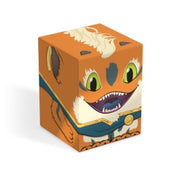 Squaroes - Boulder 100+ - MTG - Foundations - Loot - Orange rectangular deck box with a cartoon monster face, green eyes, and sharp teeth, made of sturdy material.