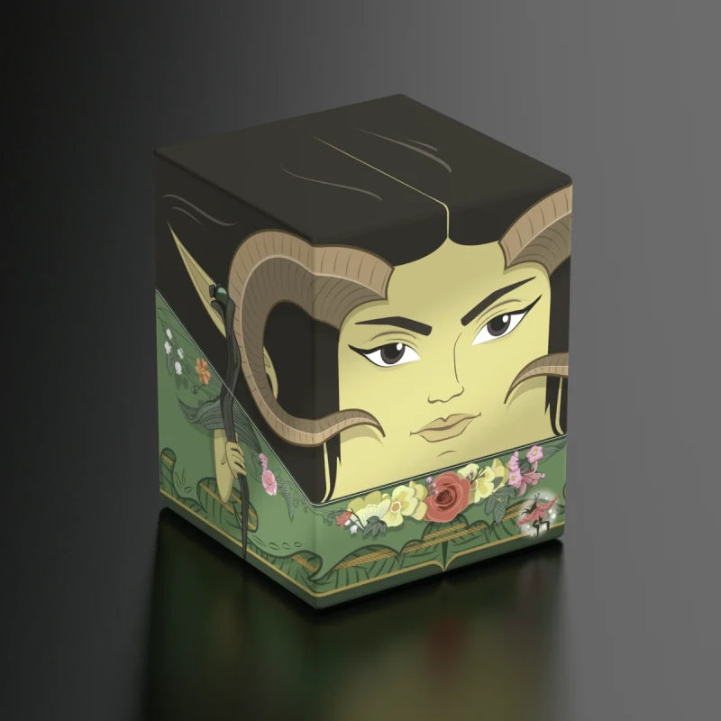 Squaroes 100+ Boulder: Lorwyn Eclipsed - Maralen - Cube-shaped collectible with stylized female face, large curved horns, and floral patterns on green base.