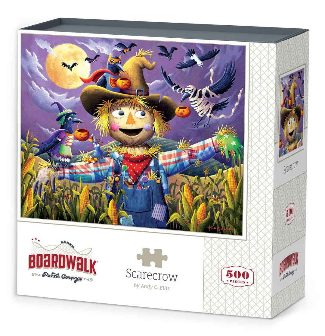 Boardwalk 500 Piece Puzzle: Scarecrow - Colorful autumn scarecrow wearing a blue shirt and red bandana in a moonlit cornfield with flying crows and a pumpkin on its