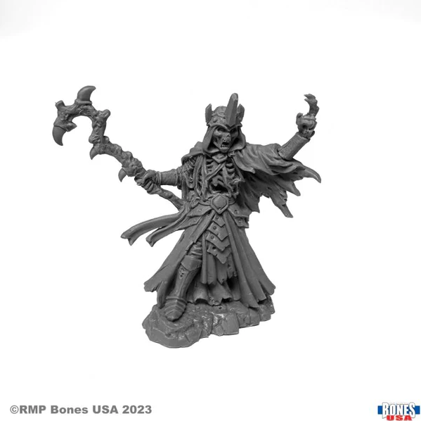 Kars Karval, Lich - Detailed gray miniature of armored lich wielding a jagged staff and casting a spell with clawed hand raised.