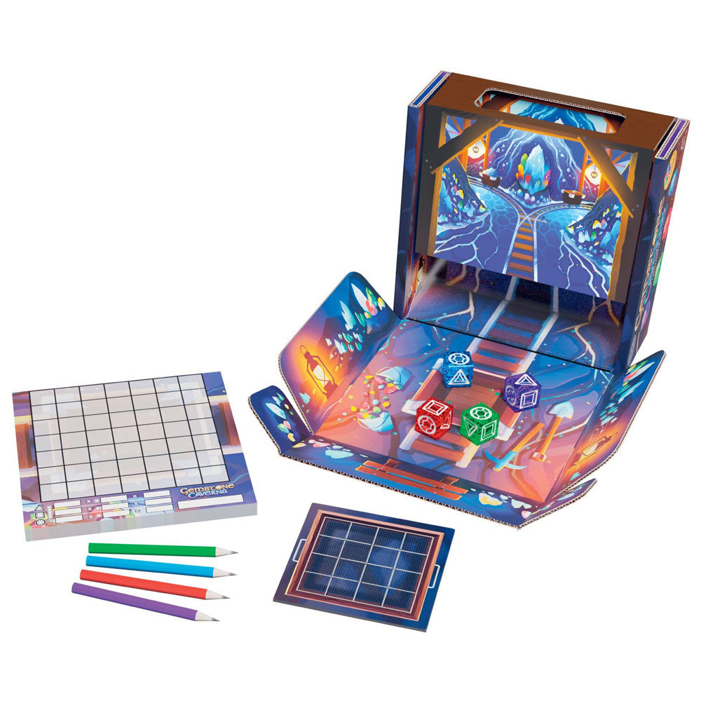Gemstone Caverns - Colorful board game setup with a fold-out cardboard play area featuring gem and cavern artwork, multicolored pencils, dice,.