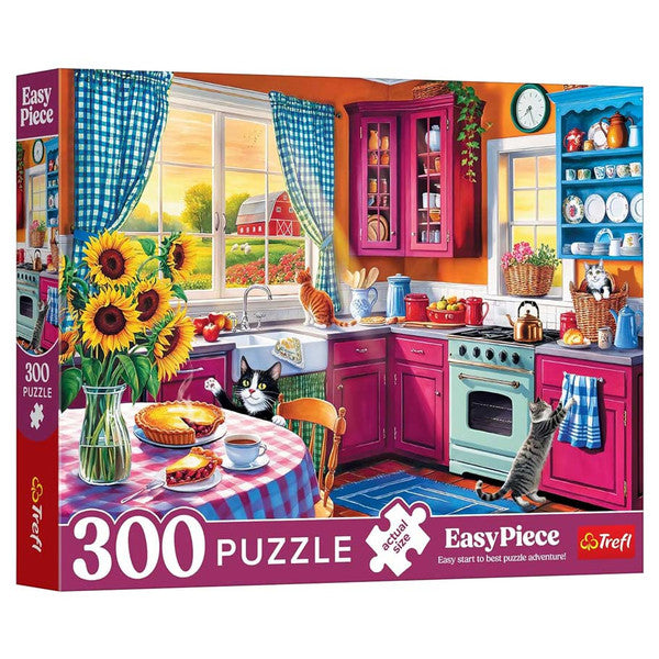 Puzzle: Morning in the Kitchen 300 Piece - Colorful 300-piece kitchen puzzle with bright red cabinets, sunflower vase, and blue checkered curtains.