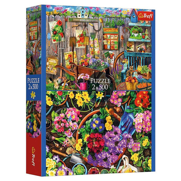 Puzzle: Working in the Garden 2x500 Piece - Colorful garden-themed puzzle box showing vibrant flowers, gardening tools, and a rustic shed scene, 2x500 pieces.