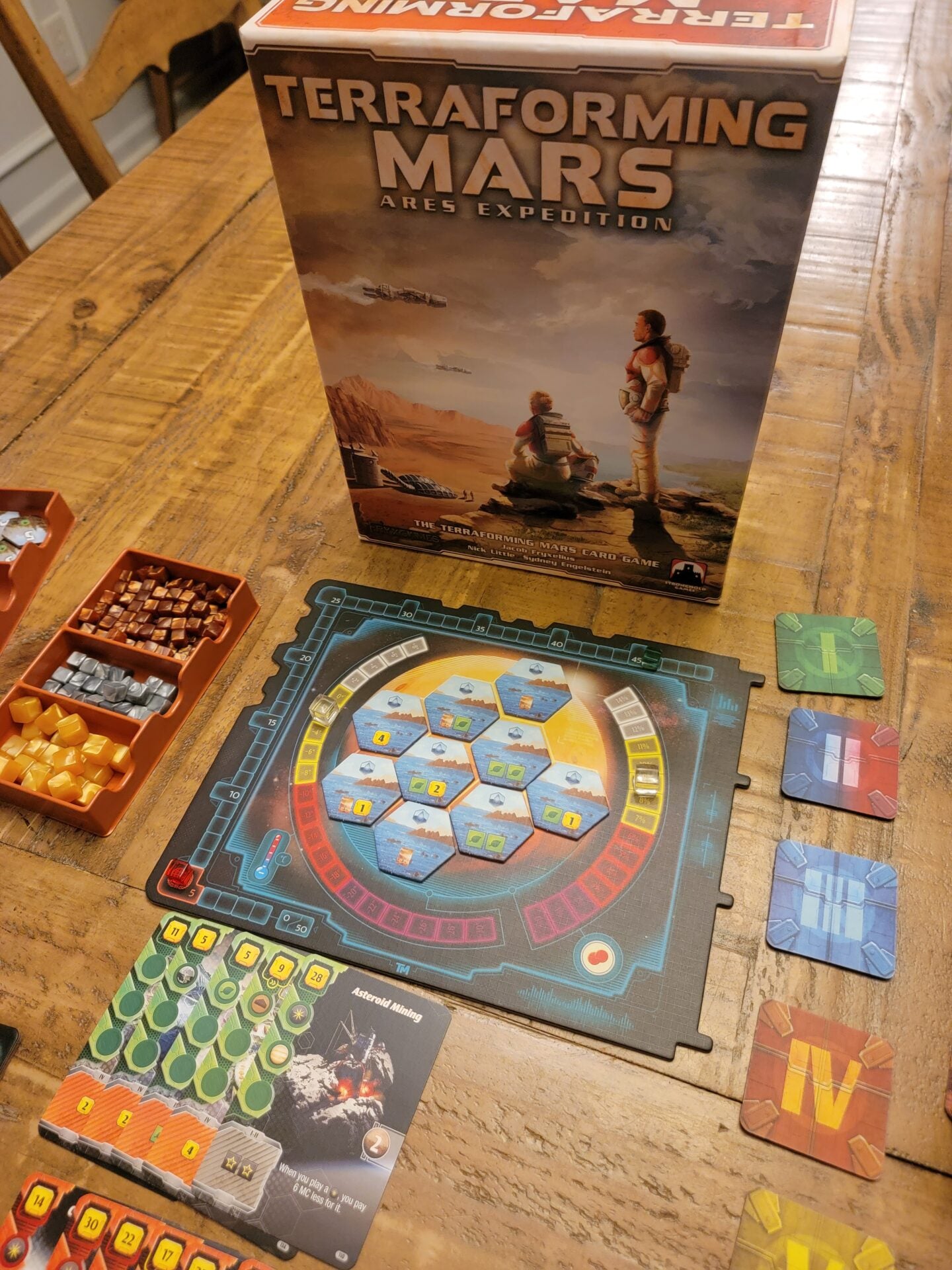 Terraforming Mars: Ares Expedition - Ares Expedition board game with hexagonal tile board, colorful resource tokens, cards, and detailed box featuring red planet