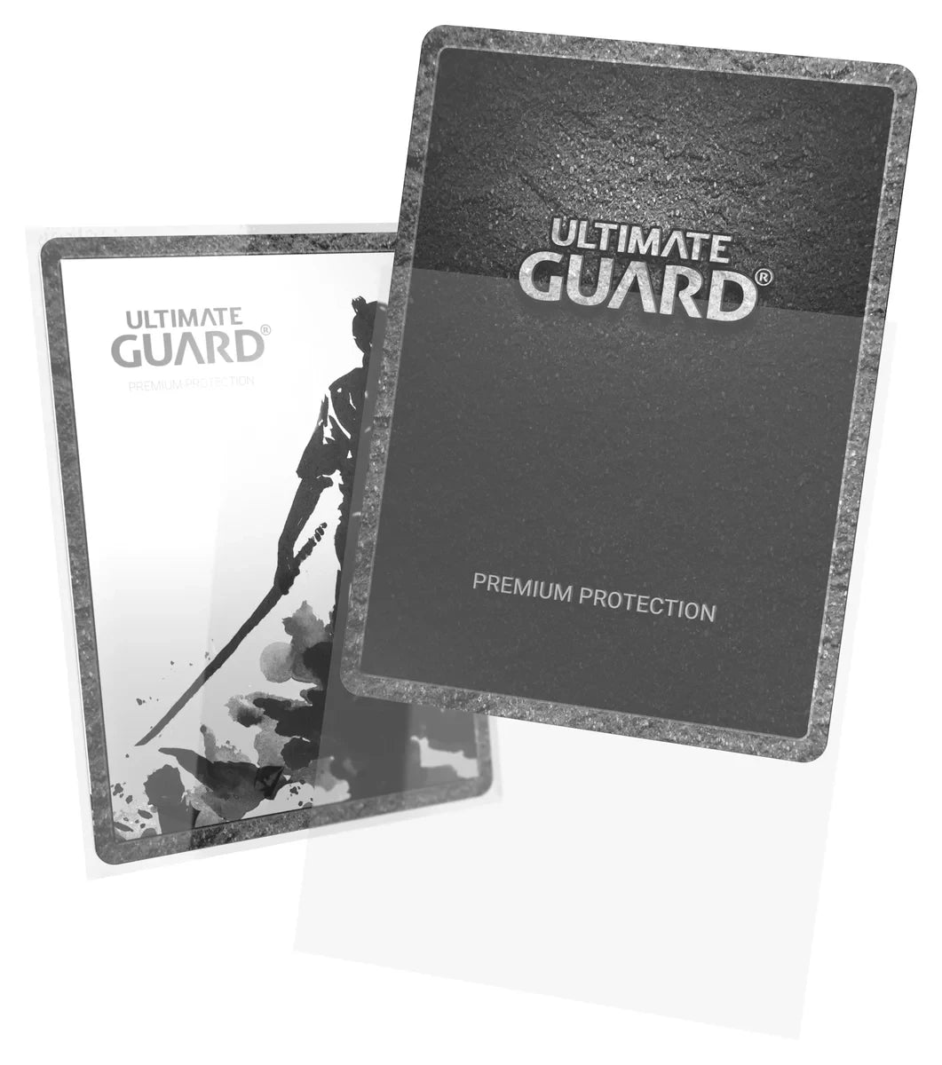 Ultimate Guard Katana 100 ct Standard Sleeves - Transparent - Transparent card sleeves with a subtle textured border, branded with "Ultimate Guard" and designed for premium protection.