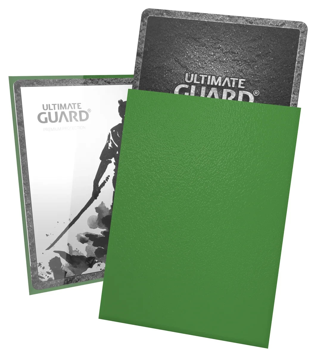 Ultimate Guard Katana 100 ct Standard Sleeves - Green - Green matte card sleeve with smooth texture, designed for standard playing cards, showing backing and logo cards inside.