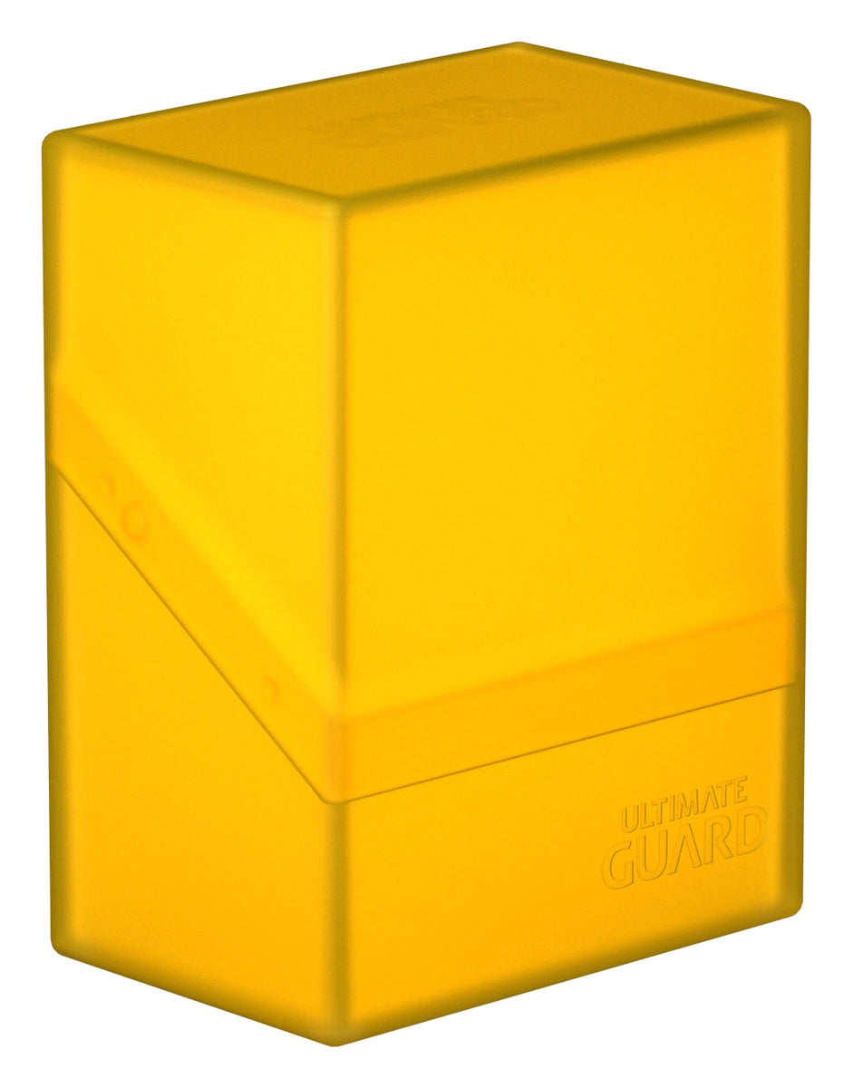 Ultimate Guard Boulder 60+ Deck Case - Amber - Amber translucent rectangular deck case with smooth matte finish and subtle embossed branding on the lower front.