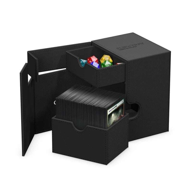 Ultimate Guard Flip'n'Tray 133+: Monocolor - Black - Matte black rectangular deck box with a flip-open lid, featuring a removable tray holding colorful dice and a spacious lower