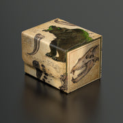 Ultimate Guard Sidewinder 100+ Deck Box: Bloomburrow - Lumra, Bellow of the Woods - Square deck box with aged parchment design featuring a roaring bear and skull illustrations in earthy tones.