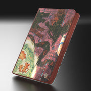 Ultimate Guard Zipfolio 360 Xenoskin: Bloomburrow - Season of the Burrow - Compact zippered folio with a textured, colorful abstract design featuring dark silhouettes and earthy tones.