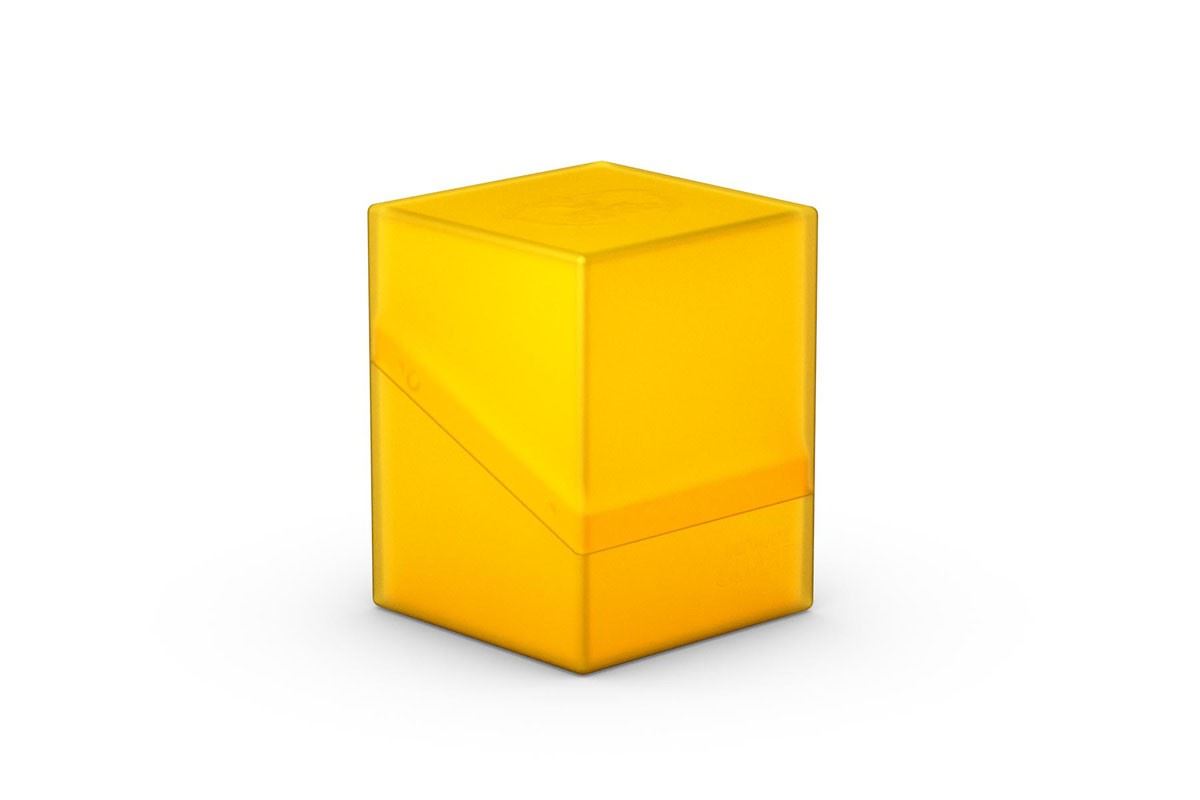 Ultimate Guard Boulder 100+ Deck Case - Amber - Amber translucent plastic deck case with a sturdy rectangular design and snap closure.