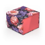 Ultimate Guard Sidewinder 133+ - Floral Places III - Vivid Field - Square deck box with floral pattern of pink and purple flowers on a black background, featuring a solid coral red panel on.