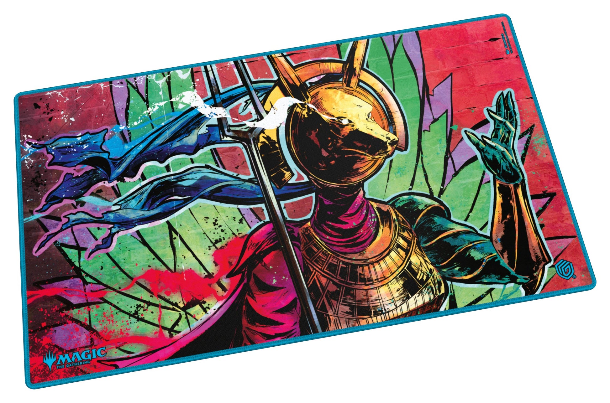 Ultimate Guard: Play-Mat Magic: The Gathering - Aetherdrift - Hazoret, Godseeker - Rectangular gaming playmat with vibrant red and green hues featuring a gold-armored figure holding a staff, blue border trim.
