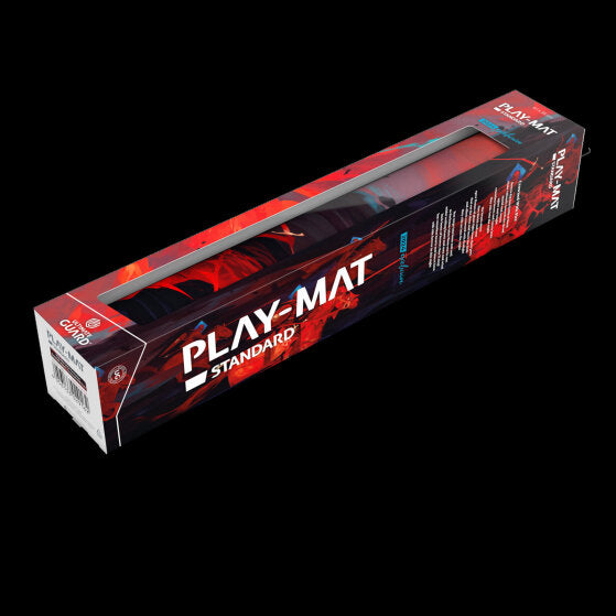 Ultimate Guard Play-Mat 2024 Exclusive Dominik Mayer: Crowned with Fire - Rectangular black and red play-mat rolled inside a transparent box with bold white and red "Play-Mat Standard" branding on.