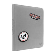 Ultra Pro Zippered PRO Binder 9-Pocket: Patchcraft - Gray - Gray zippered card binder with two colorful Patchcraft logos and rounded corners.