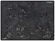 Ultra Pro Battle Mat: Warhammer 40,000 Kill Team - Service-Nexus Delta A - Dark gray battle mat with scattered debris and small red and metallic details across textured surface.