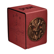 Ultra Pro Alcove Flip Box - Doom: Creatures of Hell - Pinky (PREORDER) - Red textured flip box with black "DOOM" logo and a bronze demonic face emblem with red eyes.