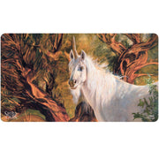 Playmat: Magic the Gathering: Secret Lair: Julie Bell Good-Fortune Unicorn - Playmat featuring a white unicorn with a glowing horn against a detailed forest background with twisted trees and warm.