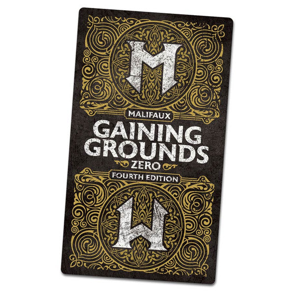 Malifaux 4th Edition: Gaining Grounds 4th: Season Zero (PREORDER) - Black rectangular game box with gold intricate swirls and silver stylized "M" logos, titled "Malifaux Gaining Grounds Zero.