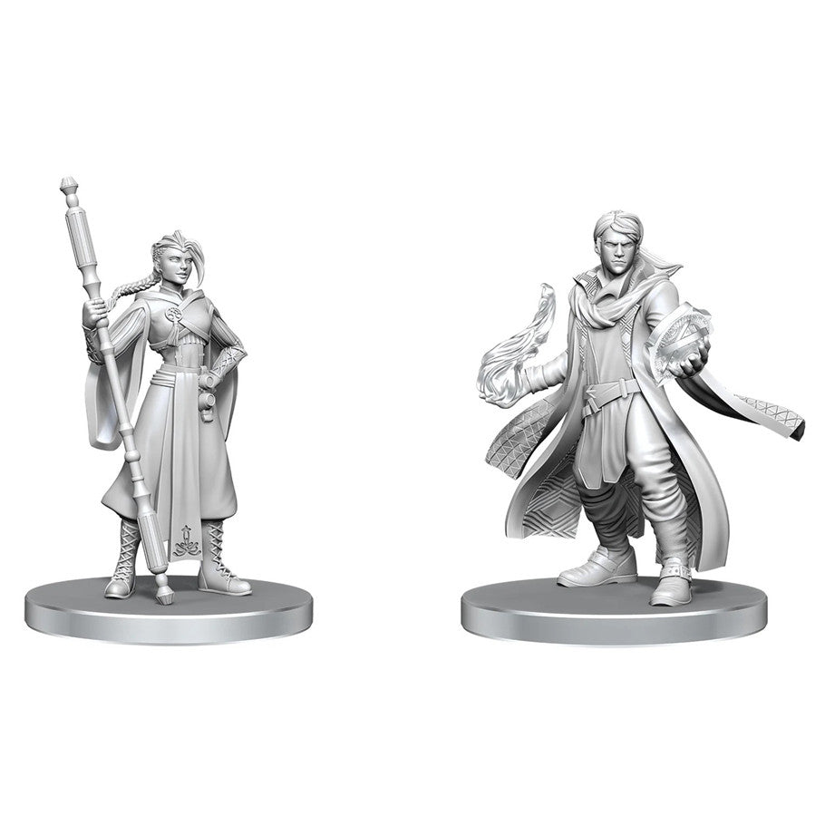 Critical Role Unpainted Miniatures: Beauregard Lionett & Caleb Widogast - Unpainted gray resin miniatures of a female warrior with a staff and a male mage casting spells, both on round bases.