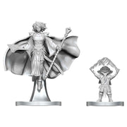 D&D Nolzur's Marvelous Miniatures: Gnome Warlock & Aasimar Wizard - Unpainted grey plastic miniatures of a robed aasimar wizard with flowing cape and staff, and a gnome warlock with raised.