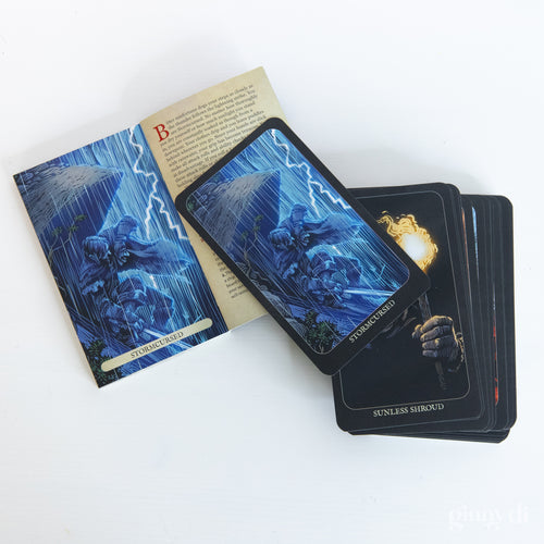 Game Master's Deck of Boons and Banes - Deck of cards with dark fantasy artwork, featuring blue lightning and cloaked figures on box and cards.