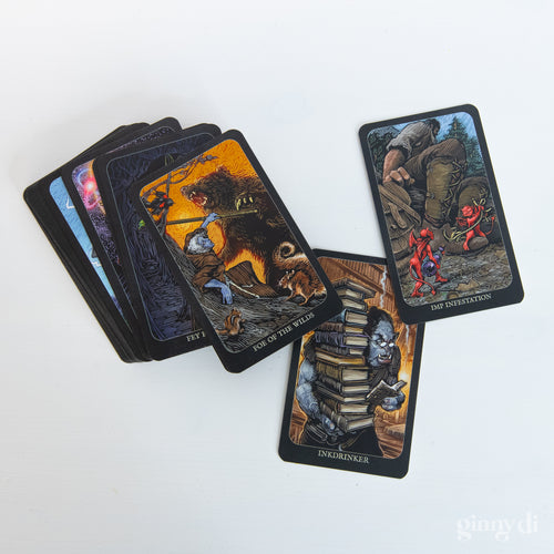 Game Master's Deck of Boons and Banes - Deck of fantasy-themed cards with dark borders and vivid illustrations of creatures and scenes, featuring detailed artwork.