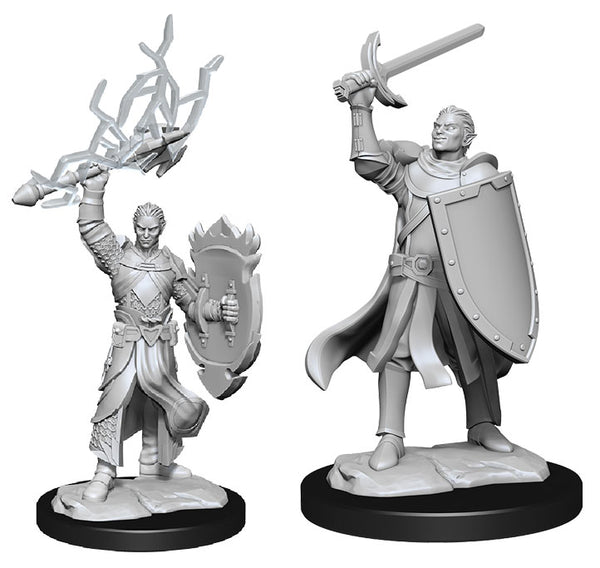 D&D Nolzur's Marvelous Minis: Half-Elf Paladin Male - Gray plastic miniatures of a male half-elf paladin holding a sword and shield, one casting a spell with branch-like energy,.