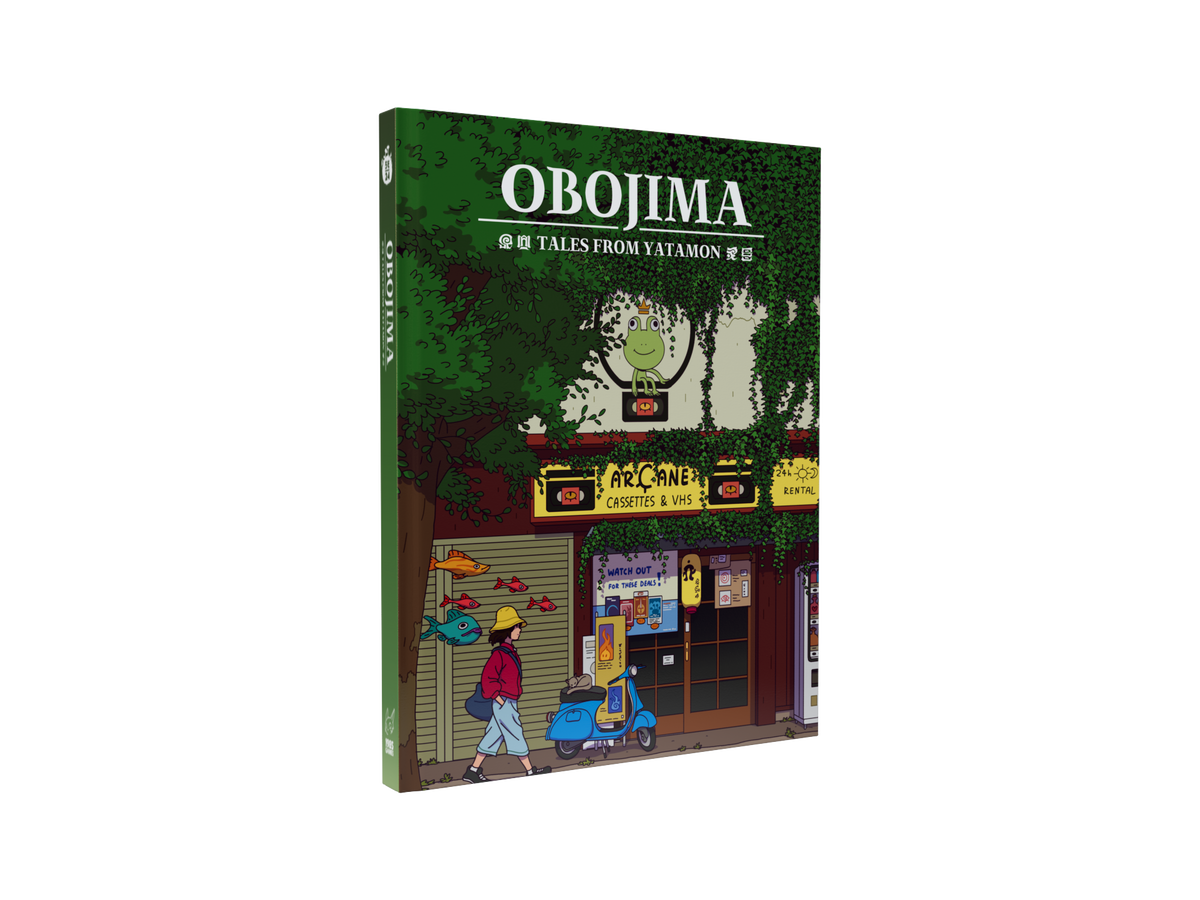 Obojima: Tales from Yatamon (PREORDER) - Tales from Yatamon with illustrated cover of street scene and characters in front of shops.