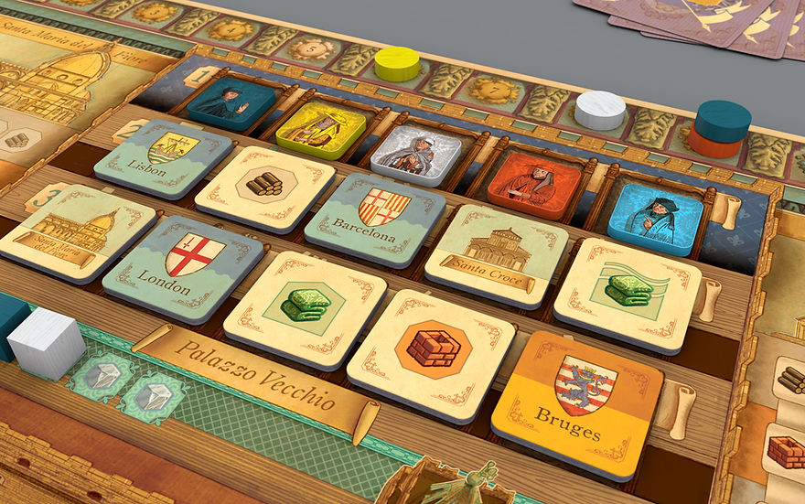 Calimala - Board game setup with beige and blue tiles featuring medieval symbols, round colored tokens, and a wooden playing board with