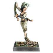 Raleah the Elder (Unpainted) - Unpainted resin miniature of a woman warrior with a curved sword, wearing tribal armor and standing on a twisted root base.