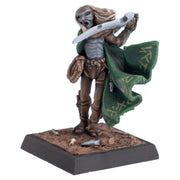 Dark Elf Assassin (Unpainted) - Unpainted miniature of skeletal dark elf assassin wielding sword with flowing green rune-inscribed cloak on square base.