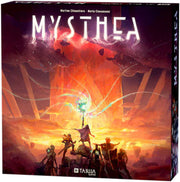 Mysthea, Essential Edition - Board game box with fiery orange and red fantasy landscape, featuring silhouettes of adventurers facing a glowing magical.