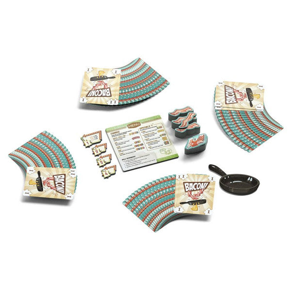 Bacon - Card game set with colorful fan-shaped cards, rule sheet, bacon-shaped tokens, and a small black frying pan accessory.