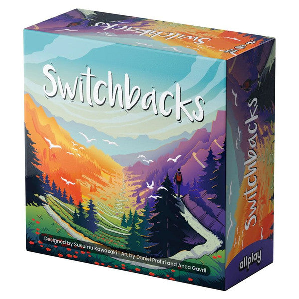 Switchbacks - Colorful game box featuring a scenic mountain landscape with a winding trail under a bright sky and bold "Switchbacks" title.