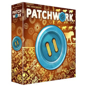 Patchwork: 10-Year Anniversary Edition - Brown board game box with a large blue button and two yellow holes on the front, decorated with various game-related icons.