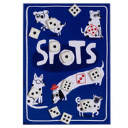 Spots - Blue rectangular board with white letters spelling "SPOTS," featuring playful black and white spotted dog illustrations and.