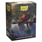 Dragon Shield Sleeves - 100ct Box Brushed Art - Christmas 2023 - Box of 100 Dragon Shield brushed art card sleeves featuring Santa battling green dragons in snowy landscape.