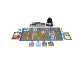 Overboss Duel - Board game setup with colorful modular play mats, cards, tokens, and a black drawstring pouch for a two-player duel game.