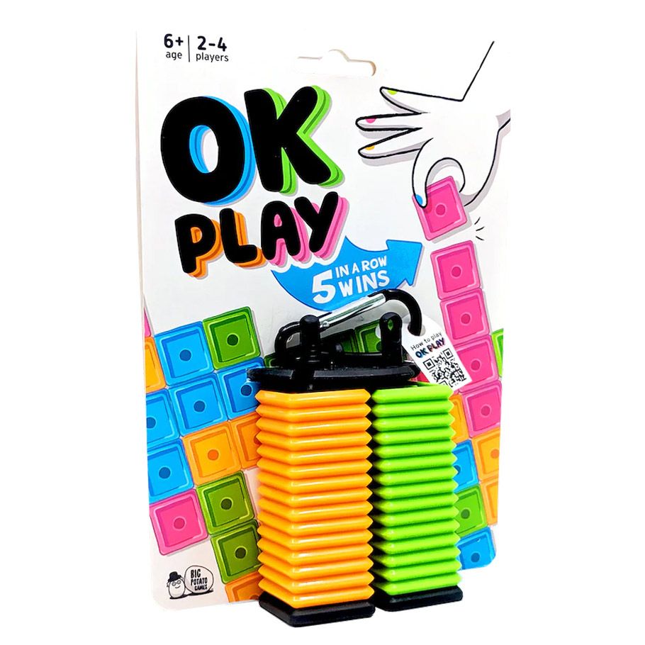 OK Play - Colorful stacked plastic blocks in orange, yellow, green, and blue with a black clip on top, packaged with a card labeled OK