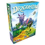 Dragomino - Colorful tabletop game box featuring cartoon dragons and a fantasy landscape under a bright blue sky.