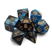 Blue and Black Marbled Dice Set - Set of seven acrylic polyhedral dice in marbled blue and black with gold numbering.
