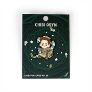 Critical Role Chibi Pin - Orym - Chibi enamel pin of a smiling character with brown hair and braids, wearing green and beige armor, holding a shield and bow,