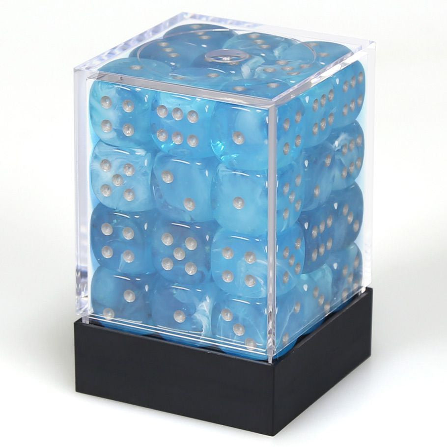 Chessex d6 Cube 12mm Luminary Sky with Silver (36) - Set of twelve 12mm translucent blue six-sided dice with silver pips in clear plastic display case with black base.