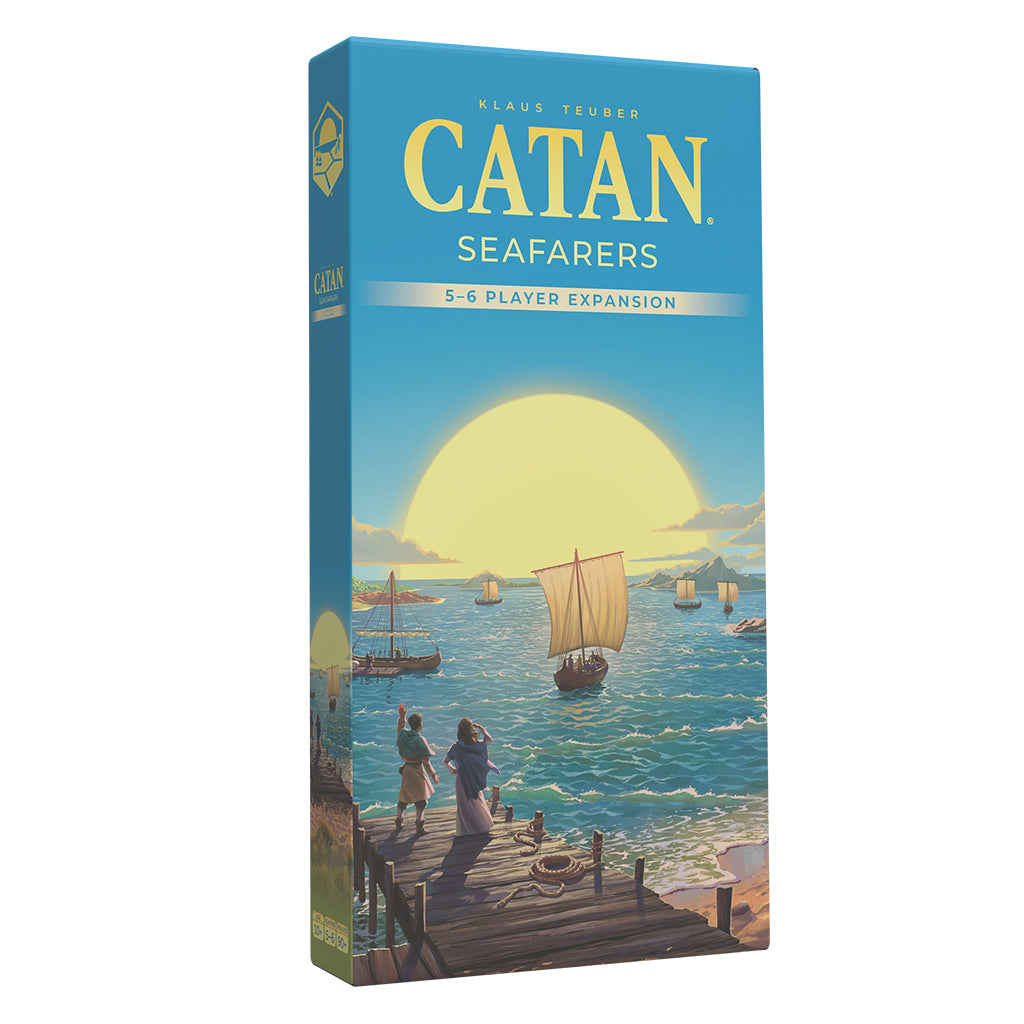 CATAN – Seafarers 5-6 Player Expansion (6th Edition) - Tall rectangular game box with blue sky, yellow sun, and illustrated sea scene featuring a sailing ship and dockside figures.