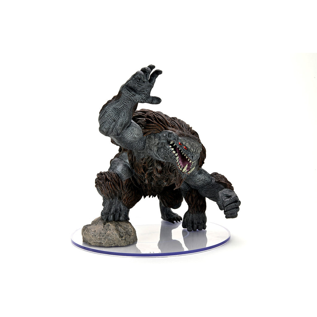 Critical Role Mini: Monsters of Wildemount - Udaak Premium Figure - Dark gray and brown textured Udaak monster figure crouching with open mouth and sharp teeth on clear round base.