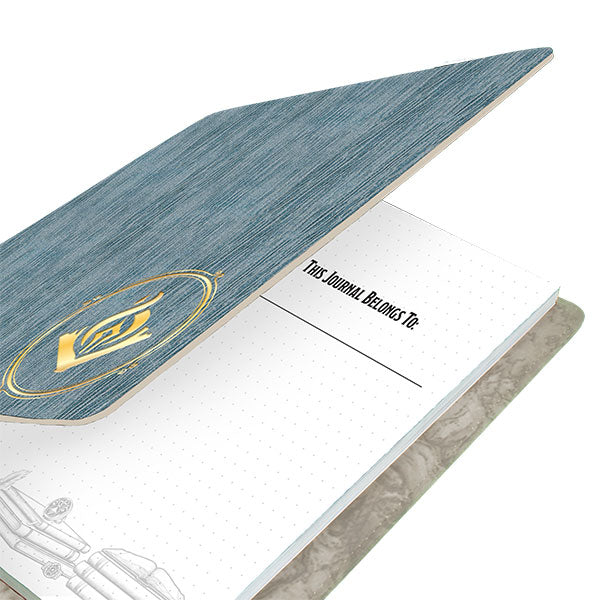 D&D Class Premium Campaign Journal - Wizard Class (PREORDER) - Blue hardcover journal with gold wizard symbol, open to dotted pages and lined section.